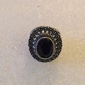 Faced onyx ring